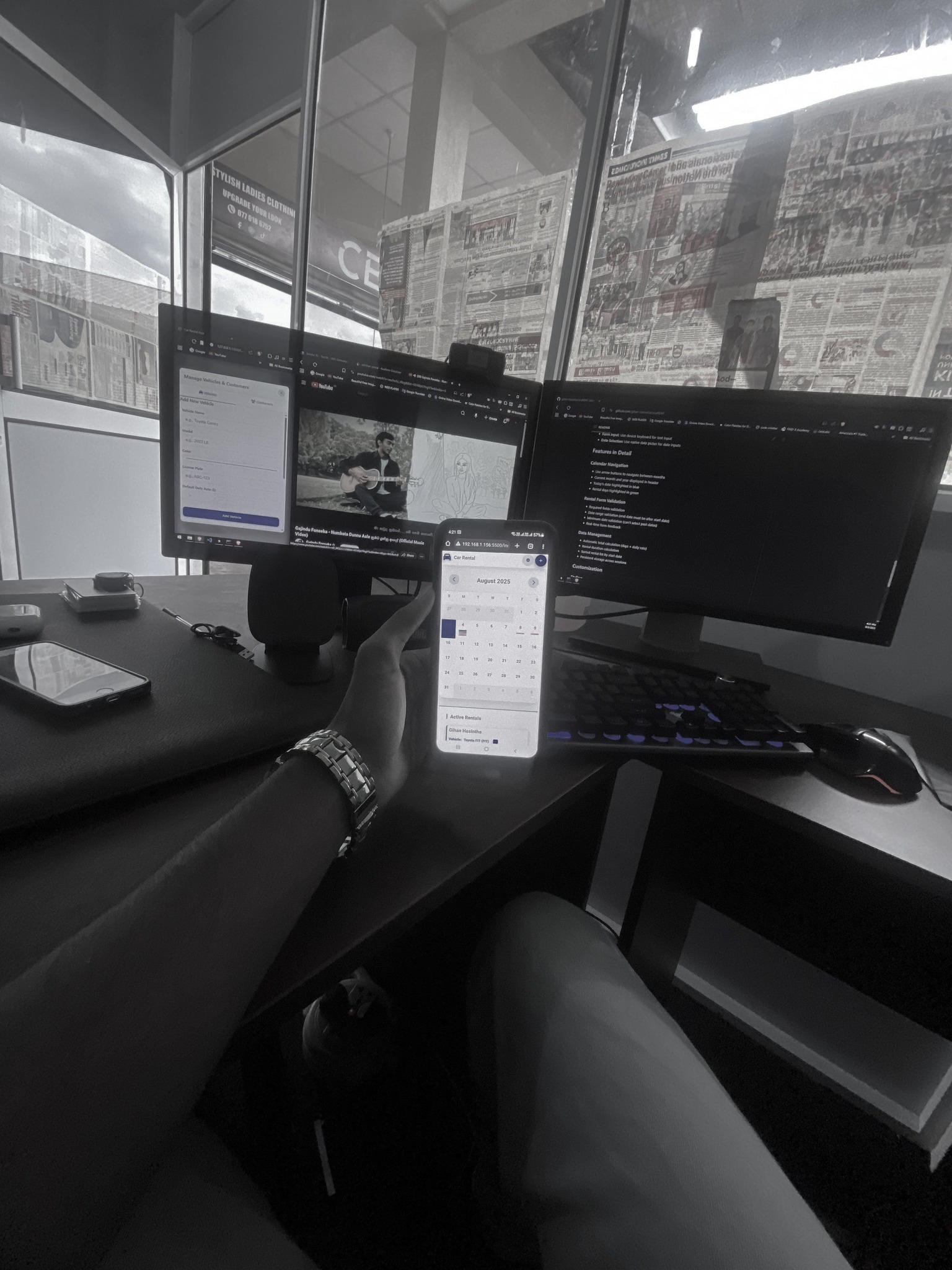 ImaTap team working at their desks with devices and wiring on table